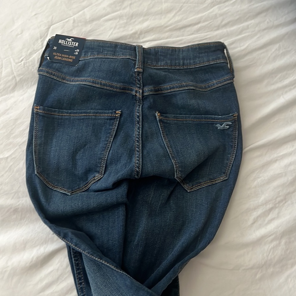 Ultra high rise jean leggings with distressed knees